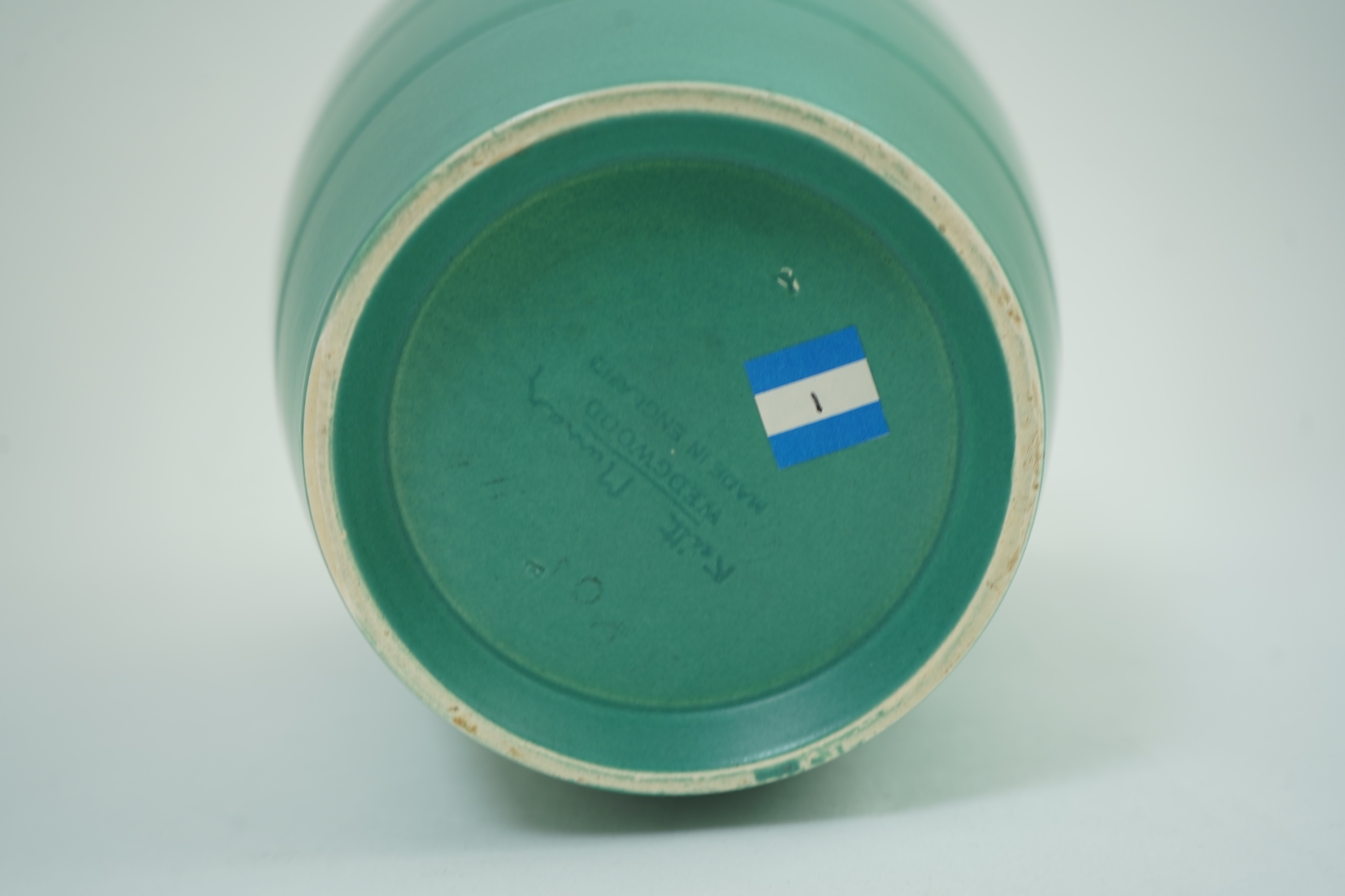 Keith Murray MC RDI FRIBA (New Zealand/British, 1892-1981) for Wedgwood: A matt green glazed tapering vase